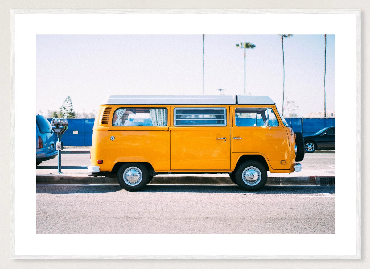 Yellow Van in a white frame; landscape front-view mockup