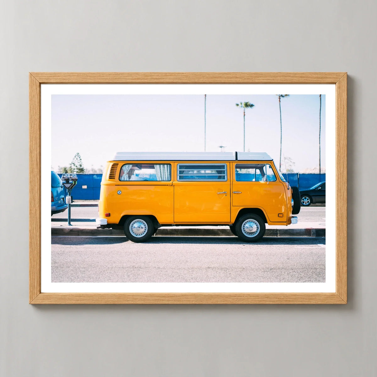 Yellow Van Coastal Photographic Print in a natural wood frame, front view